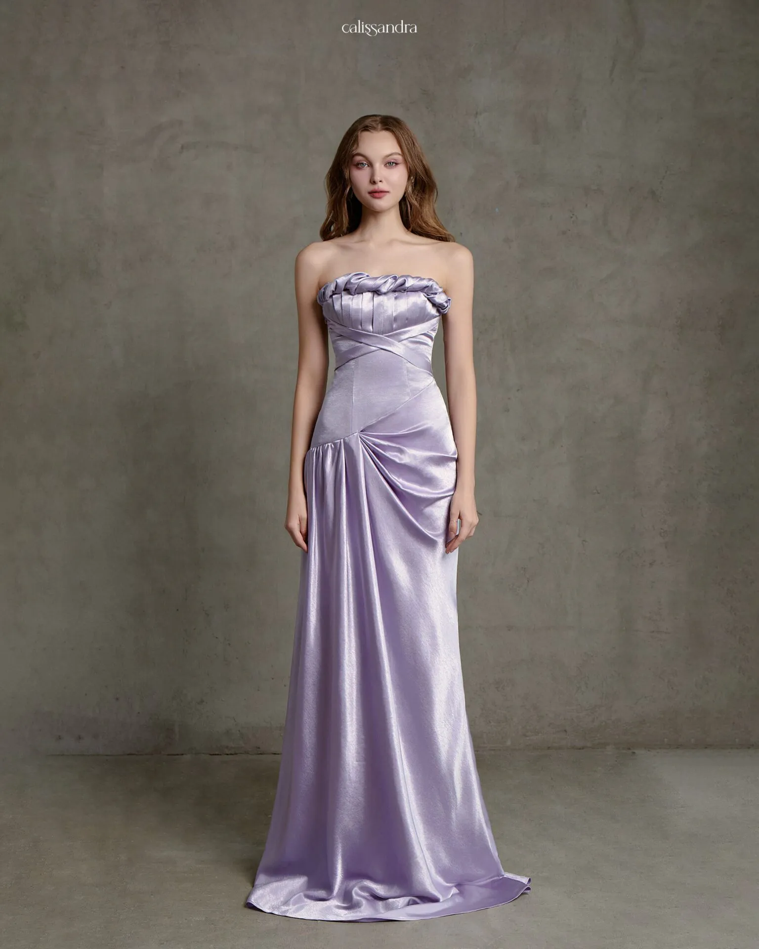 Full-length view of Selene luxury lilac purple silk satin strapless evening gown, featuring a pleated rolling trim neckline and elegant side gathered draping by Calissandra