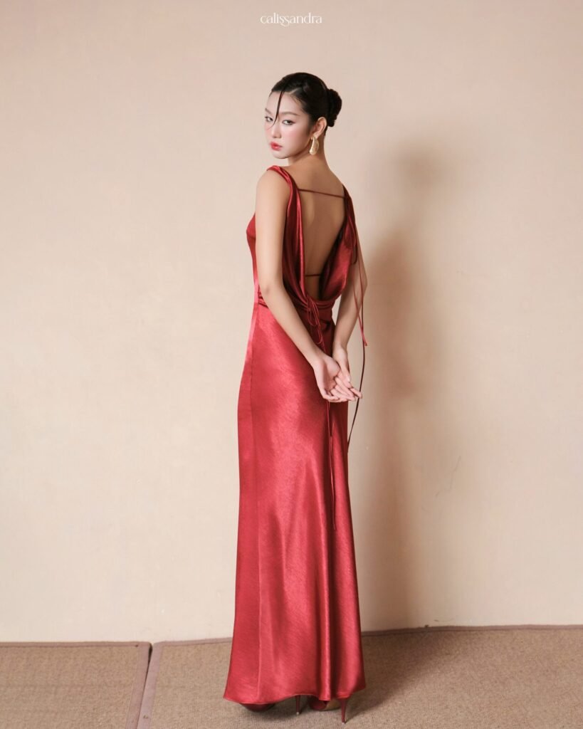 Model wearing the crimson Calissandra Crimoria Dress