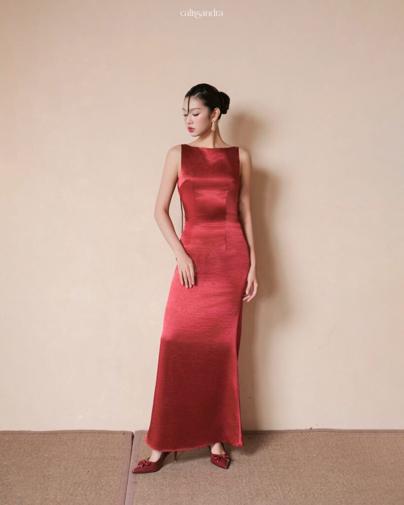 Model wearing the crimson Calissandra Crimoria Dress