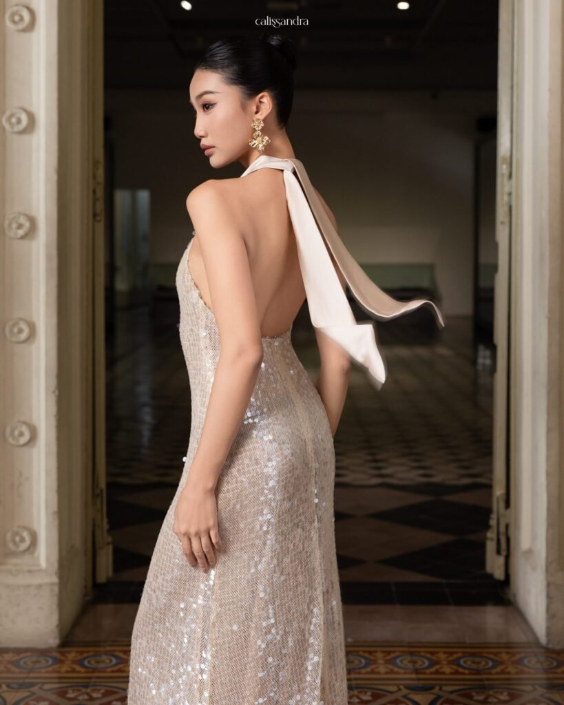 Model wearing the shimmering Calissandra Elissara Dress