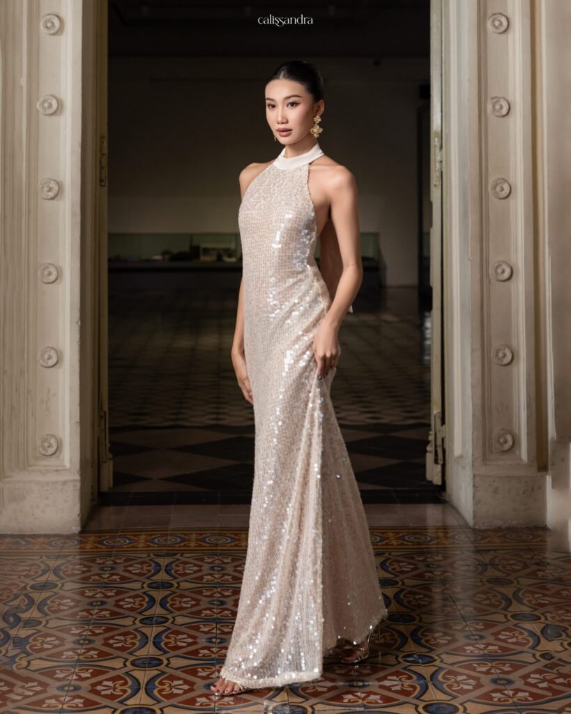 Model wearing the shimmering Calissandra Elissara Dress