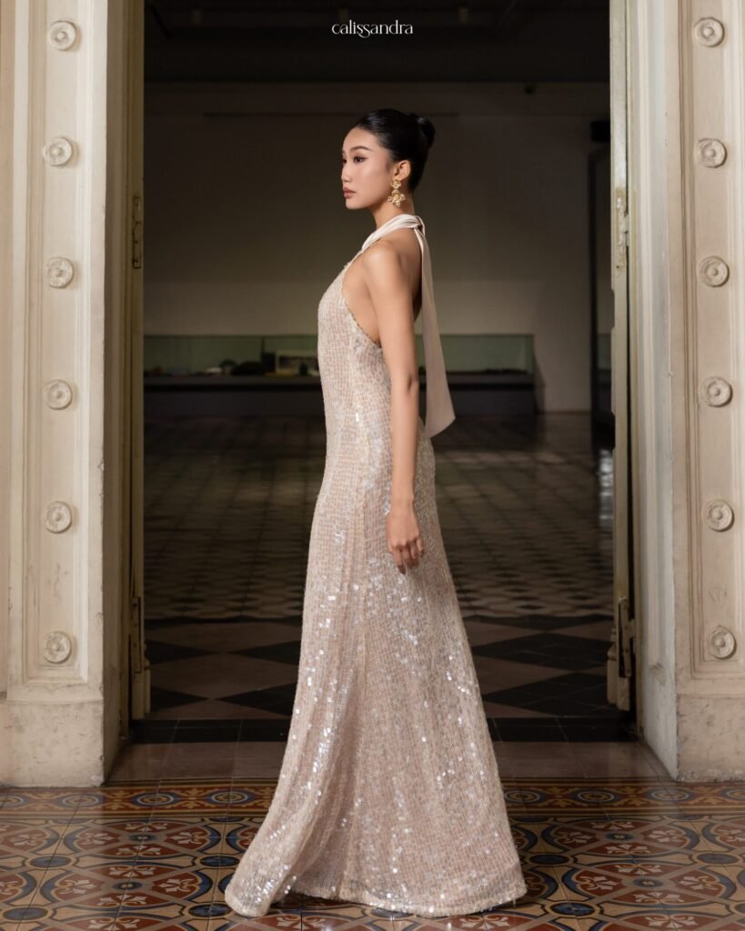 Model wearing the shimmering Calissandra Elissara Dress