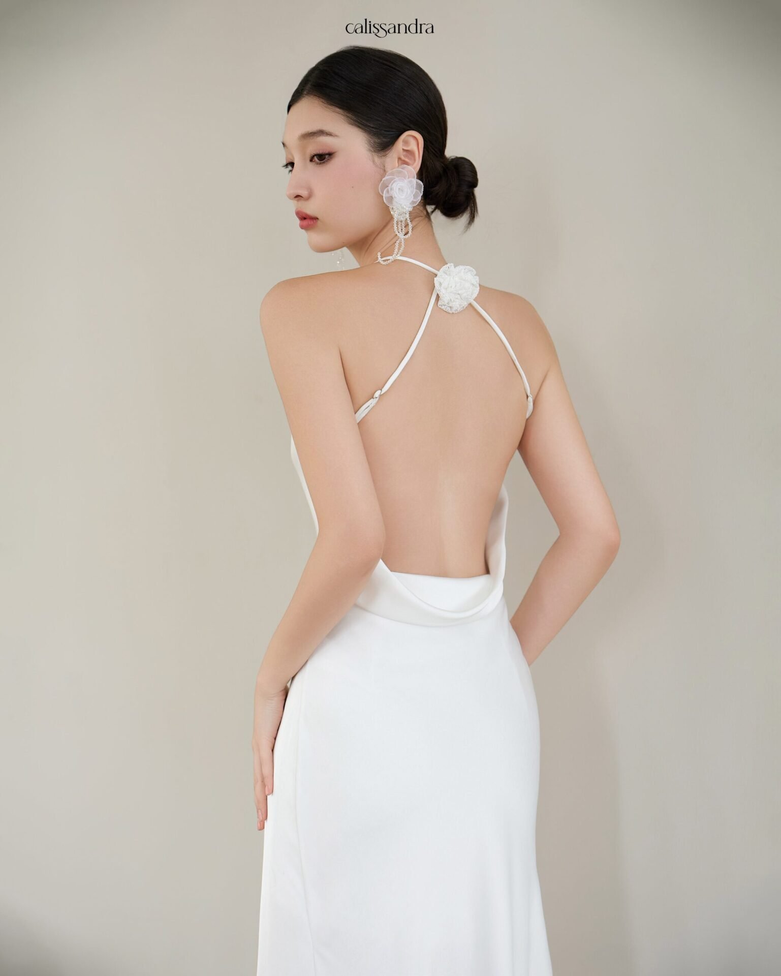 Model wearing the Calissandra Opaline Dress
