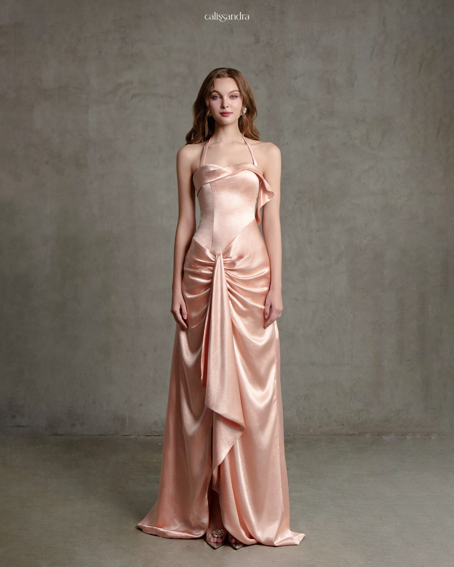 Model wearing the blush peach Calissandra Regelle Dress